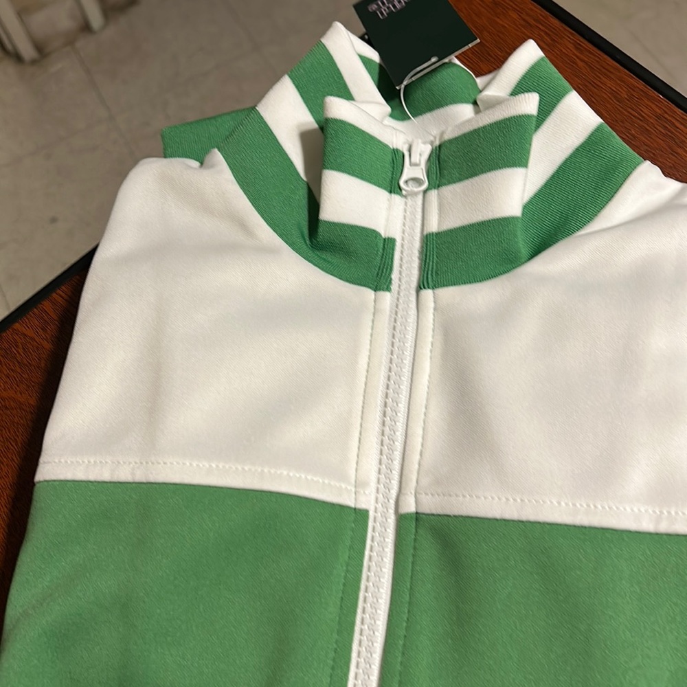 It’s a wild fable green and white sweat jacket